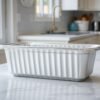 loaf pan buying guide comparing metal and glass pans side by side